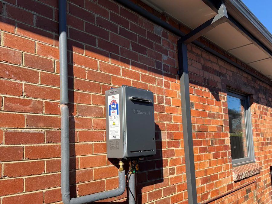 Continuous flow hot water unit installed on a Melbourne brick home